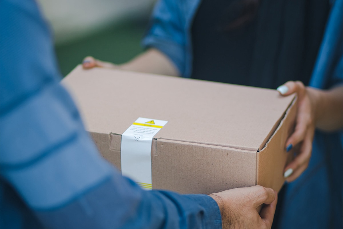 restock-reports Customer being handed a package