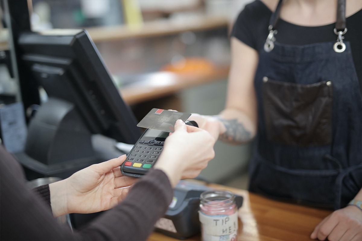 rounding-up Customer paying for a purchase with a credit card